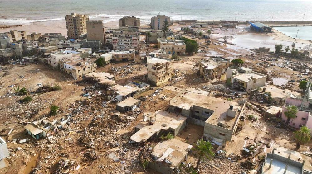 Rescue workers in Libya retrieve bodies after catastrophic floods