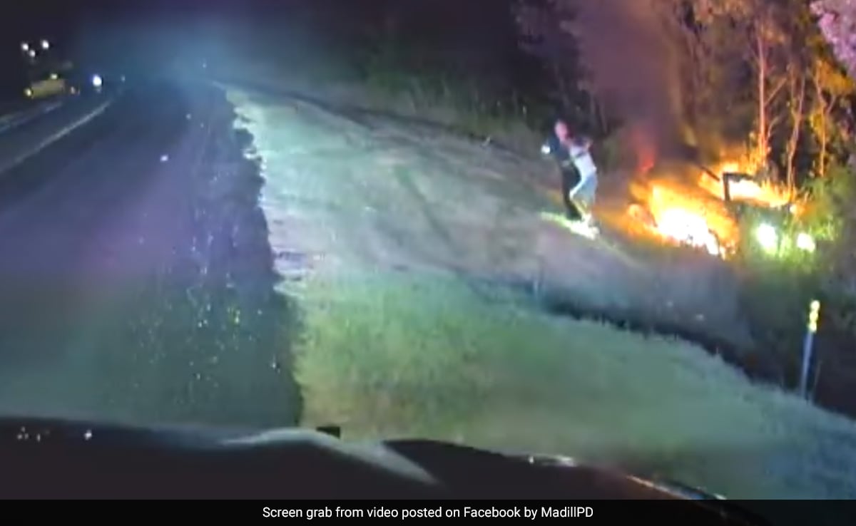 Caught On Camera: US Cop Pulls Driver Out Of Burning Car After Crash