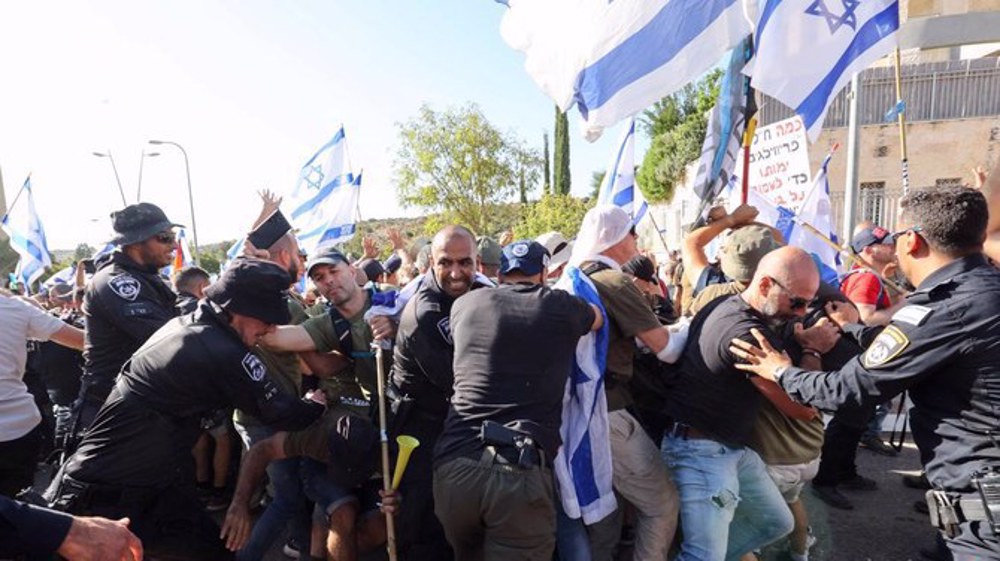 Israeli protesters scuffle with police outside justice minister’s home