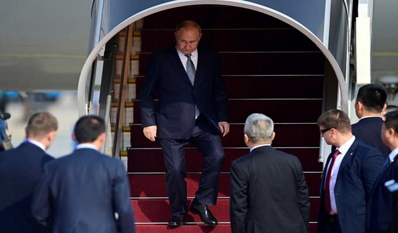 Russian President Vladimir Putin arrives in China