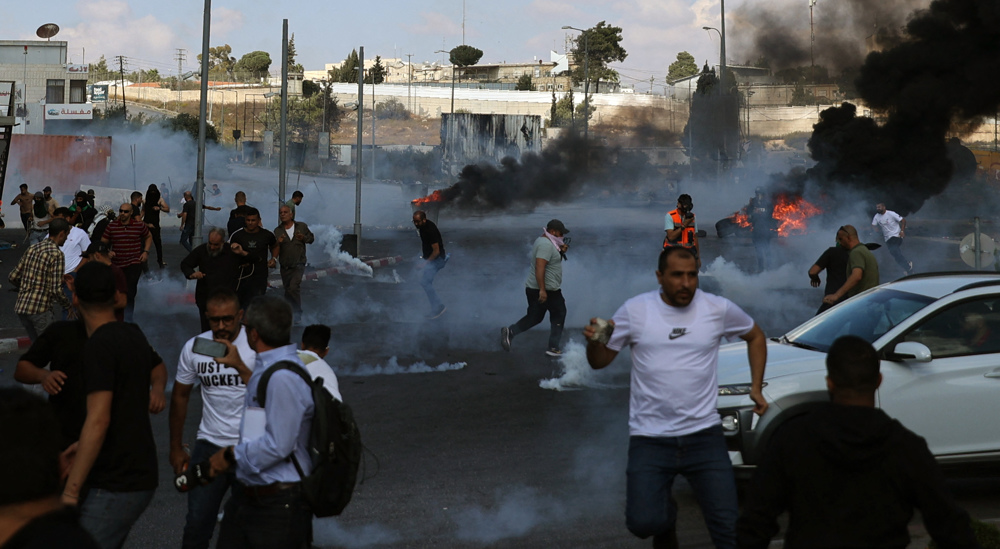 Israeli forces kill 11 in West Bank as Palestinians rally for Gaza