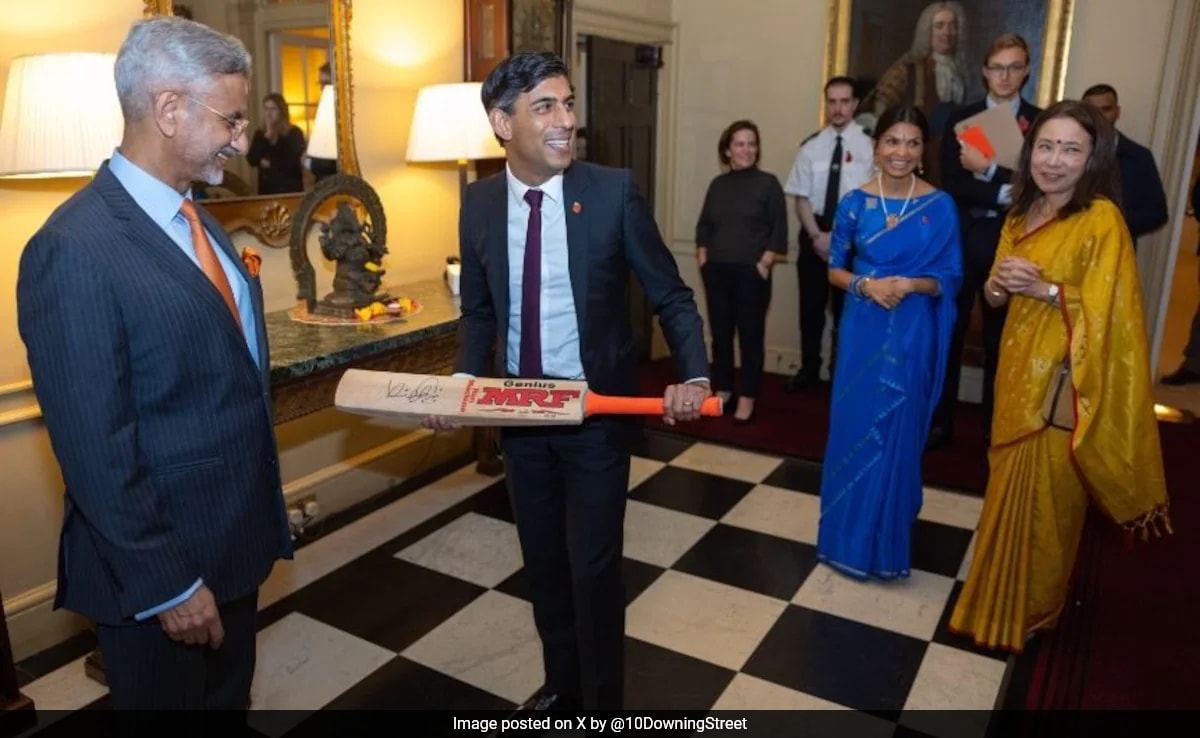 S Jaishankar Meets Rishi Sunak, Gifts Bat Signed By Virat Kohli