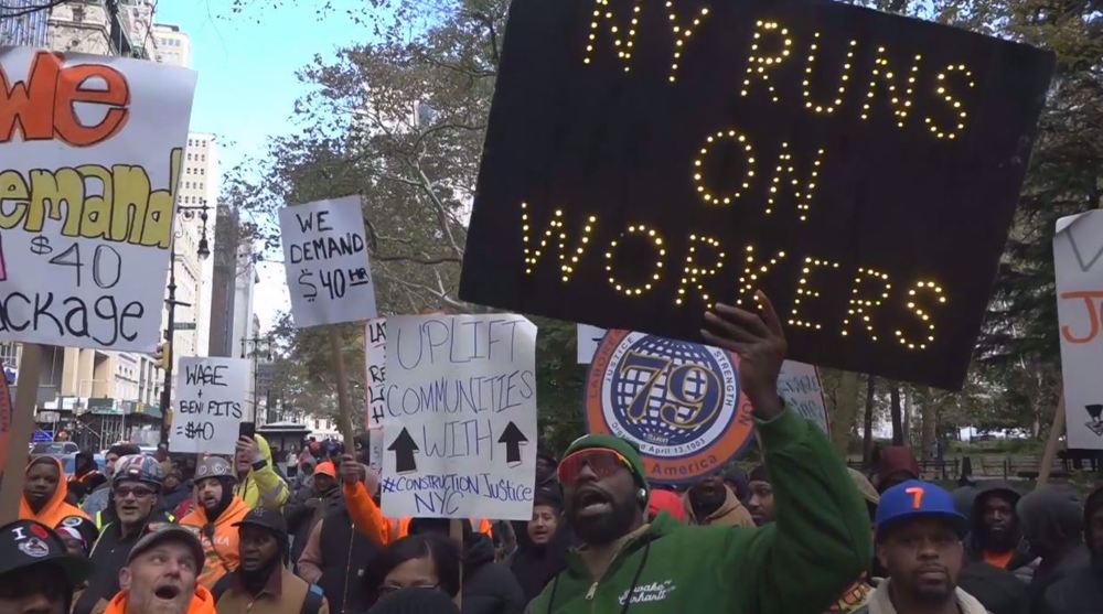 Construction workers strike over low wages in front of City Hall in NY