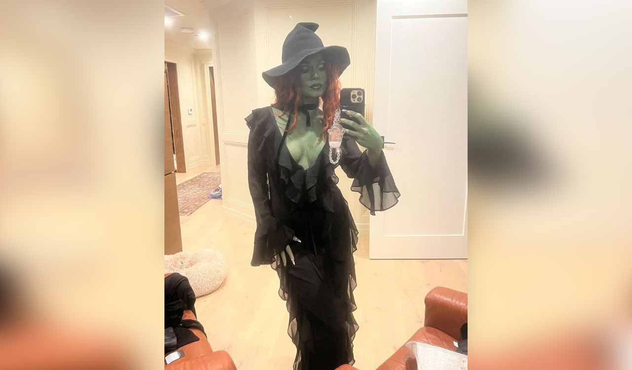 Vanessa Hudgens dresses up as the Wicked Witch of the West for Halloween