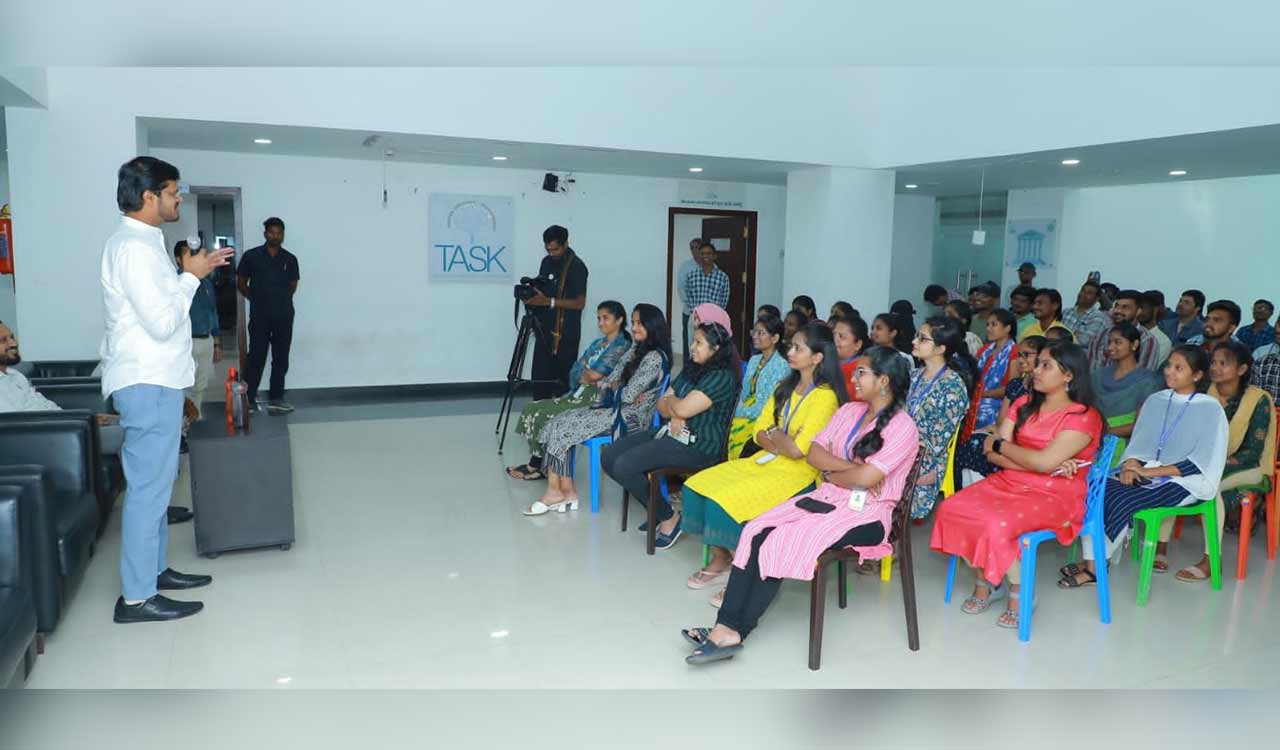 Collector Gautham interacts with employees at Khammam IT Hub