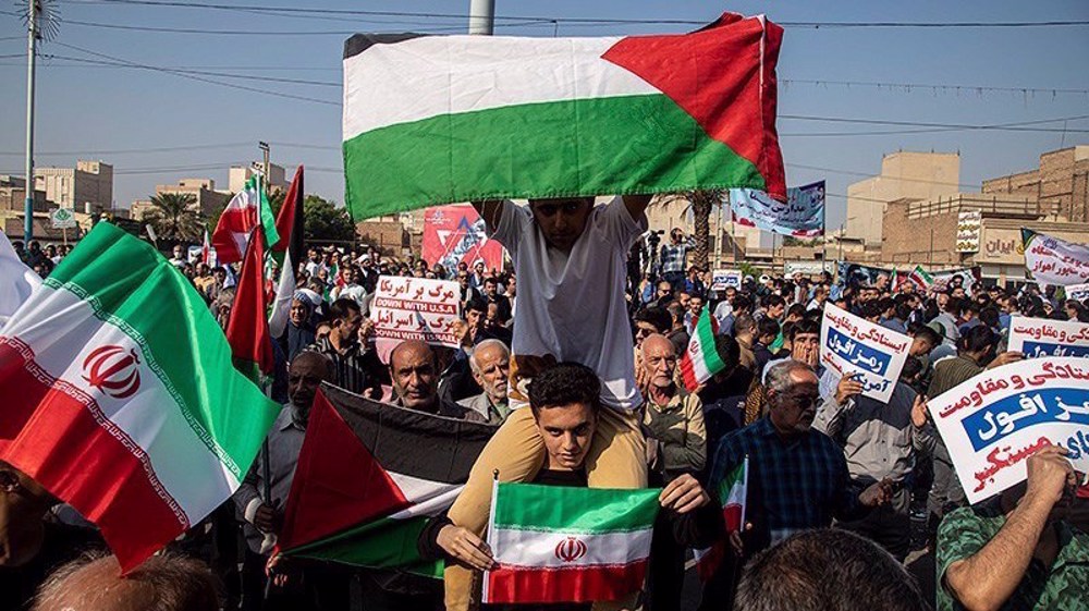 Iranians rally in solidarity with Palestinians to condemn Israeli genocide