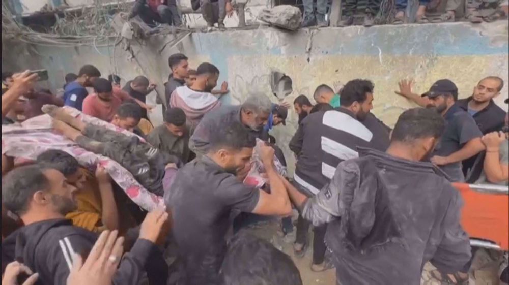 Palestinians pull children from rubble after strike on Jabalia