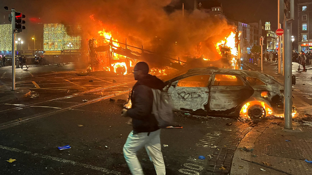 Demonstrators clash with riot police after Dublin knife attack