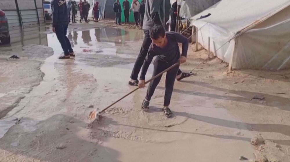 Displaced Gazans in tents at Al-Aqsa hospital after heavy rainfall