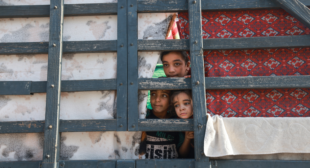 Israeli bombs hit school sheltering displaced Palestinians in Gaza