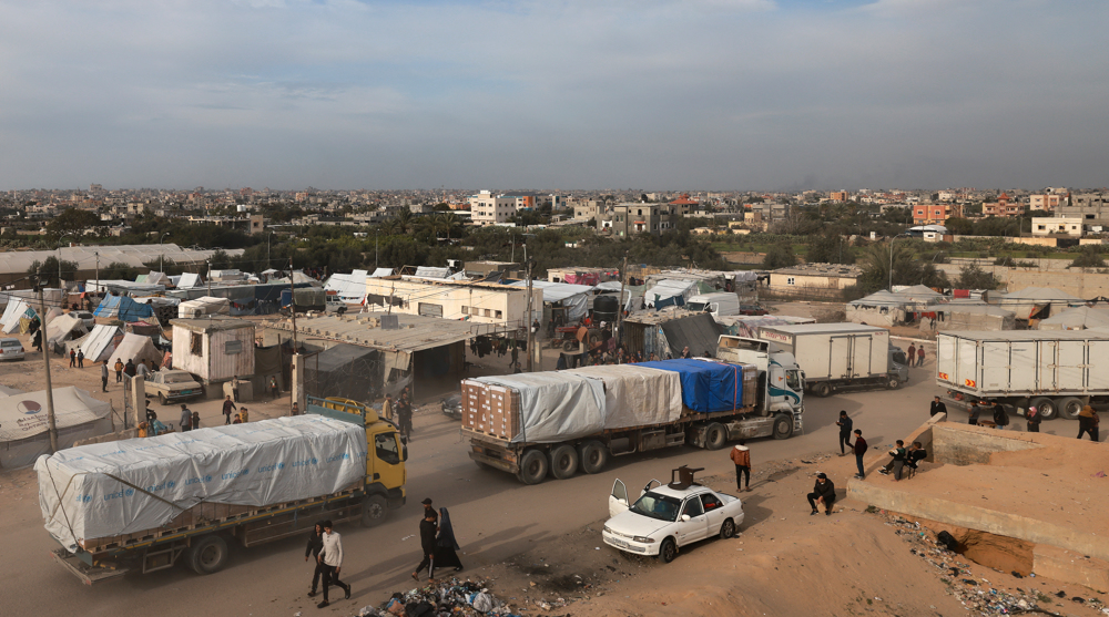 Aid trucks enter Gaza through Rafah