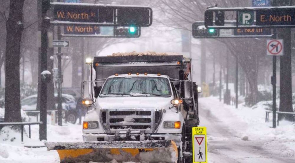 Hundreds of flights cancelled across US as winter storms cause chaos