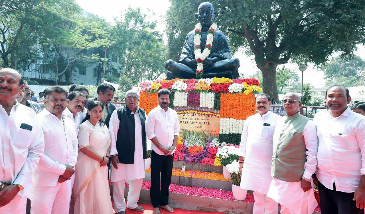 Telangana CM pays tributes to Mahatma Gandhi at Bapu Ghat