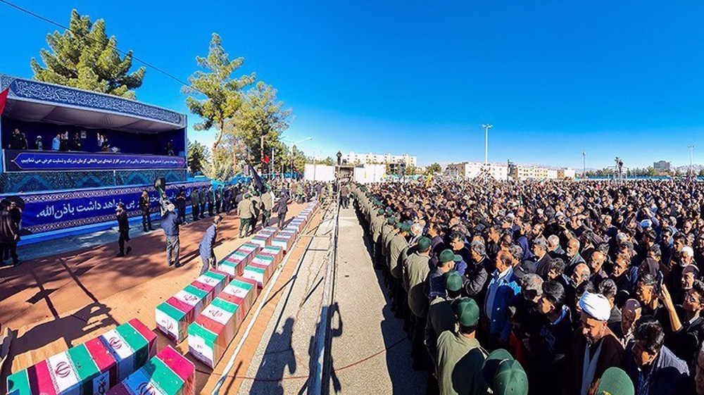 Iran holds mass funeral, vows to find terrorist 'wherever they are'