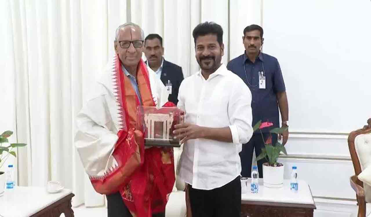 Former Telangana Governor ESL Narasimhan meets Revanth Reddy