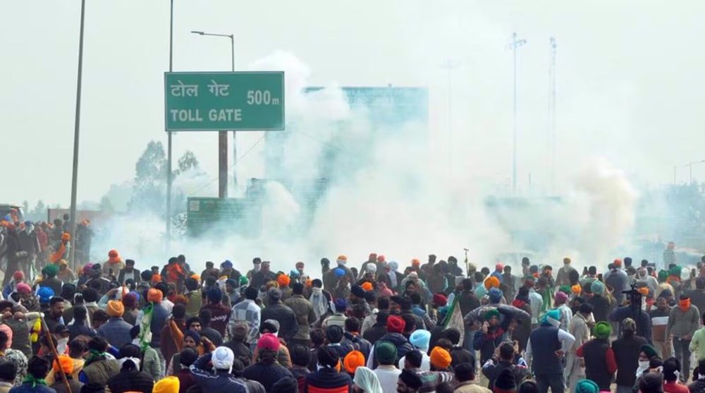 India police fire tear gas at farmers demanding higher crop prices