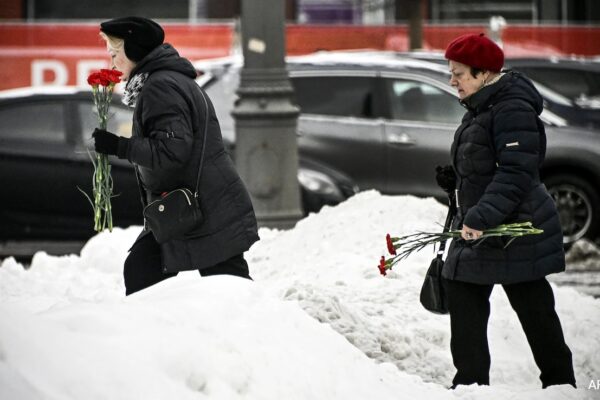 Putin Critic Alexei Navalny Tributes Paid At Moscow's 'Wall Of Grief'