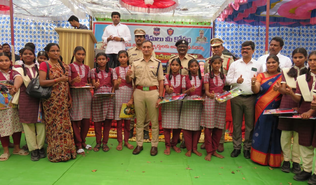 Police distribute stationery to 700 class X students in Asifabad