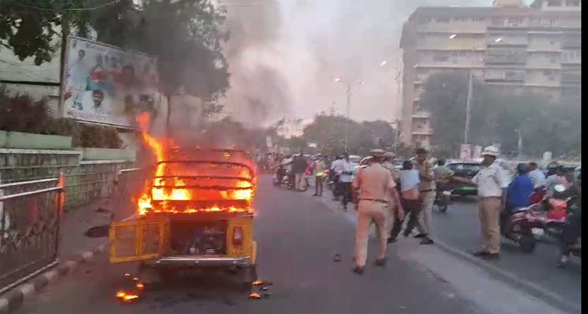 Watch: Distressed auto driver sets auto-rickshaw on fire in front of Praja Bhavan