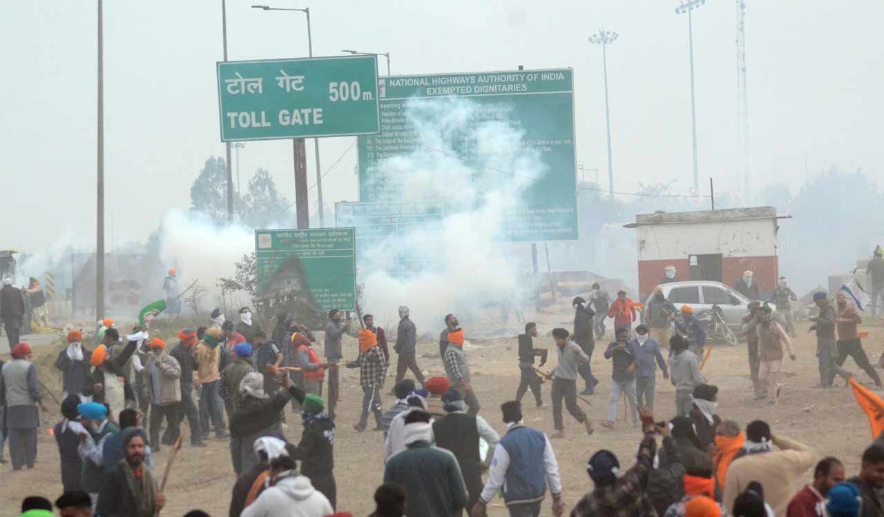 Police lob teargas shells as farmers break Haryana barricades, pelt stones