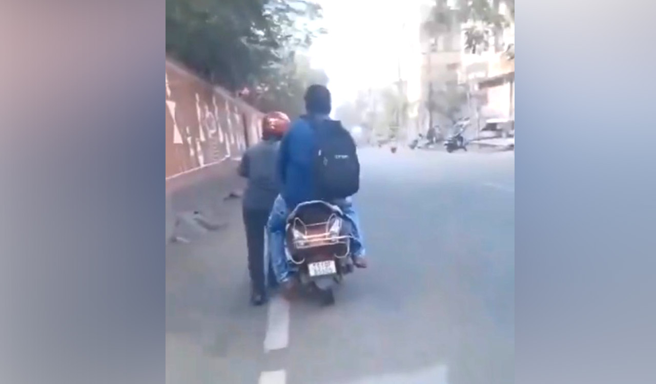 Watch: Driver drags bike as customer refused to walk to petrol bunk in Hyderabad