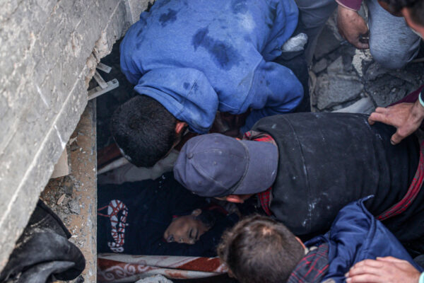 Gazans inspect rubble, pull dead boy after Israeli strike on Rafah