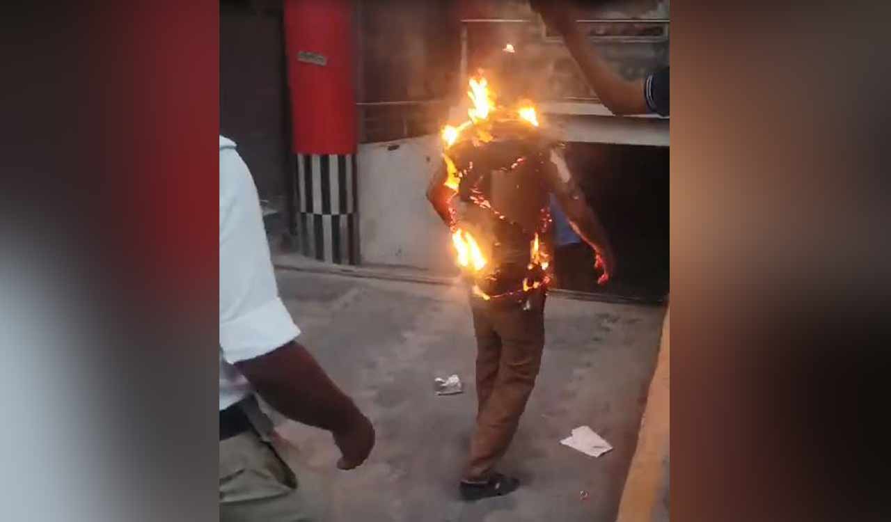 Watch: Man sets himself on fire after police seize his phone while shooting their pictures in Sangareddy