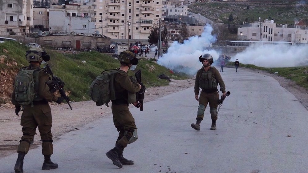 Palestinians hold funeral of teen murdered by Israeli forces in West Bank