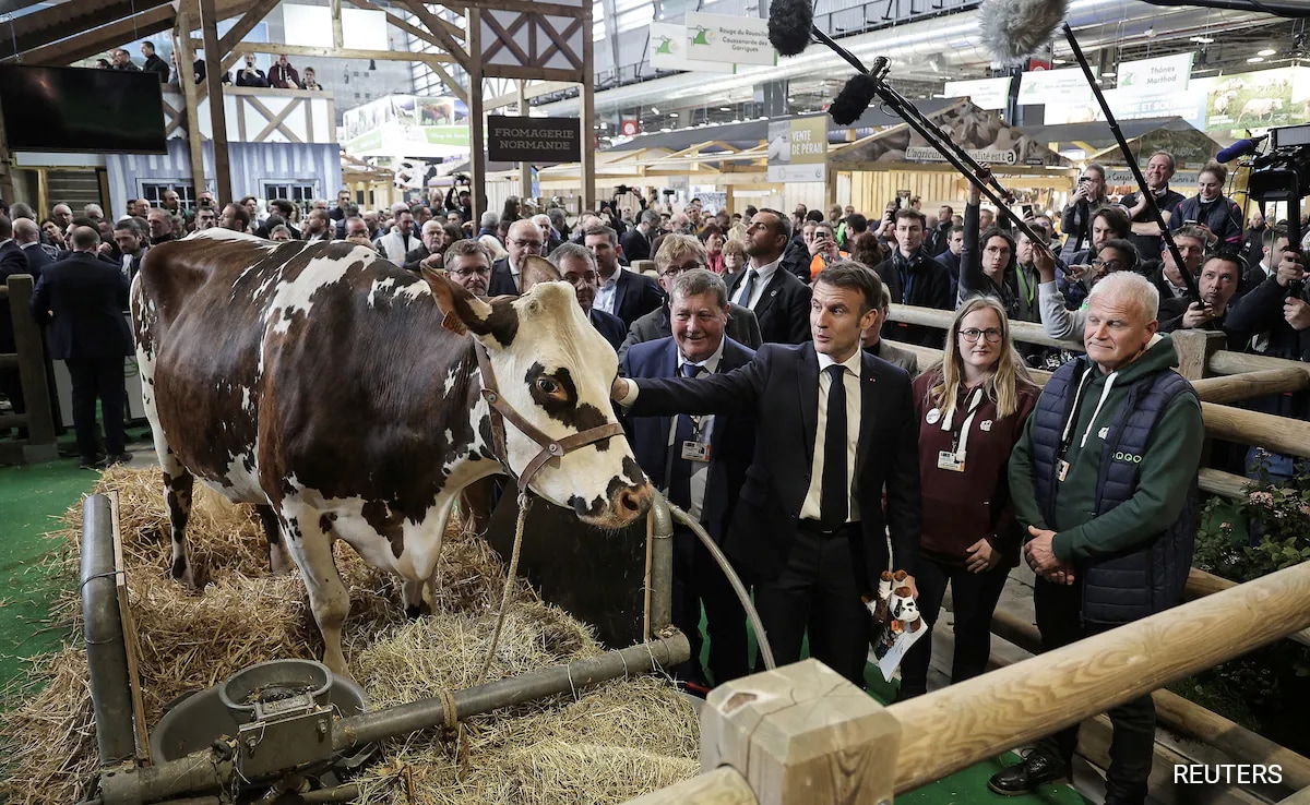 Angry Farmers Clash With Police As Macron Attends Paris Agricultural Fair