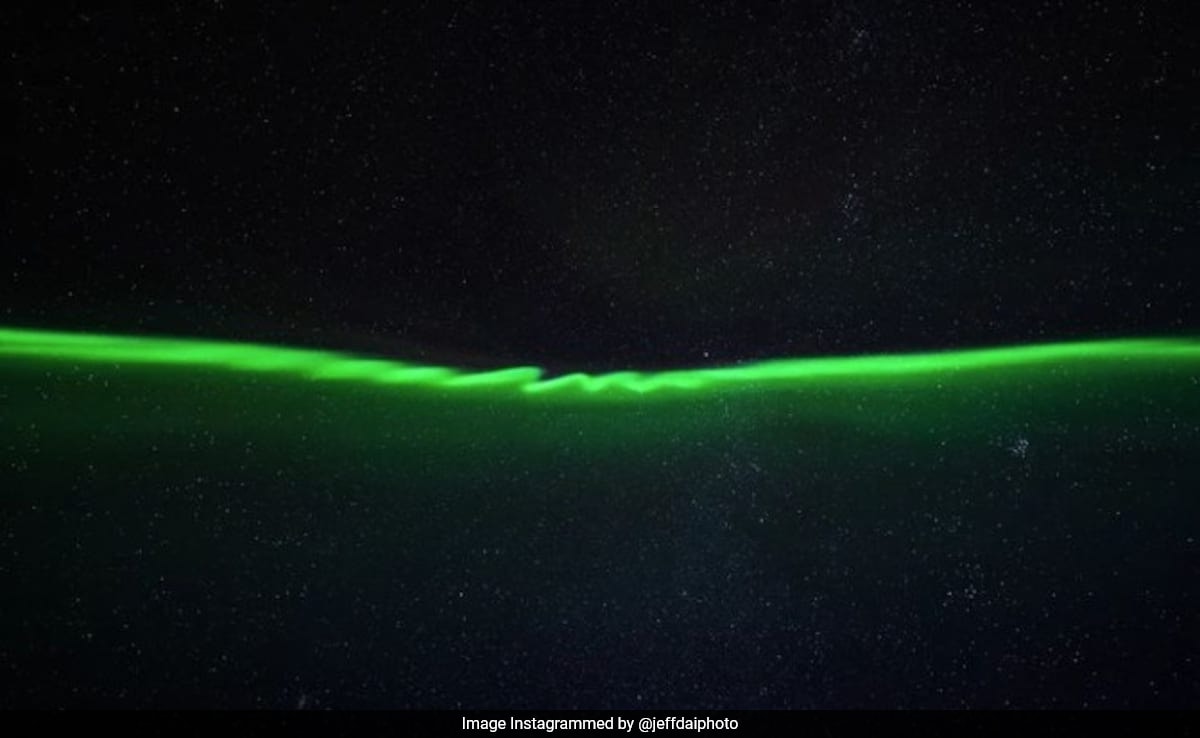 Watch: Astrophotographer Captures Extremely Rare Aurora Curls Illuminating The Night Sky