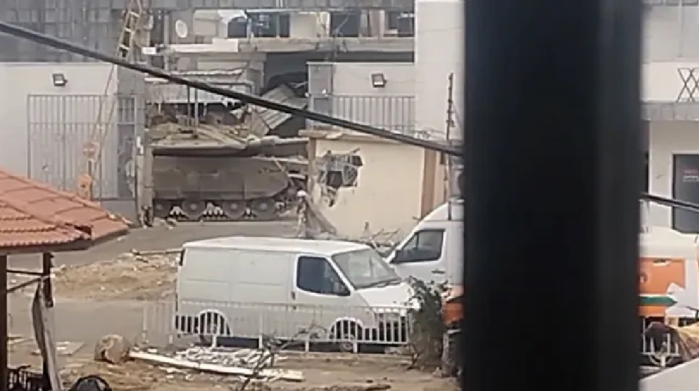 Witnesses say Israeli tanks 'crushed' bodies at al-Shifa hospital as scale of tragedy unfolds