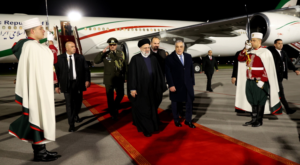 President Raeisi arrives in Algeria in first presidential visit in 14 years