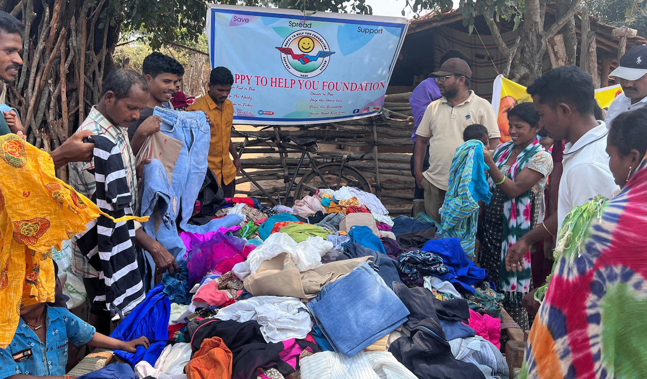 Kothagudem: NGO distributes rice, clothes to adivasis