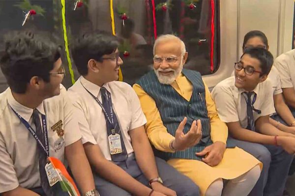 PM takes ride on India’s first underwater metro line in Kolkata with schoolchildren