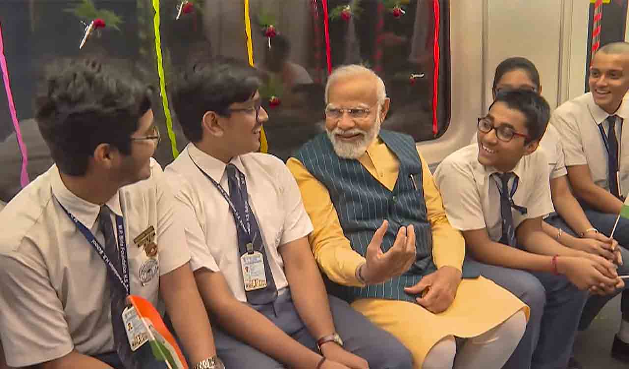 PM takes ride on India’s first underwater metro line in Kolkata with schoolchildren