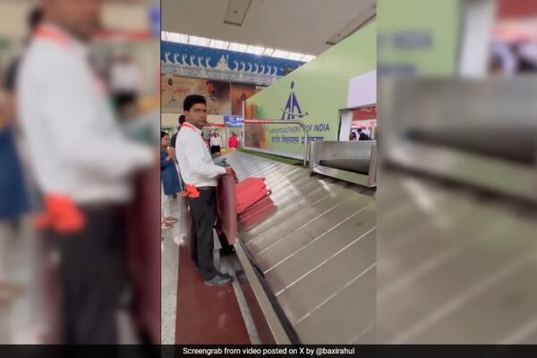 Watch: Airport Staffer Uses Sponge Board To Prevent Luggage Damage