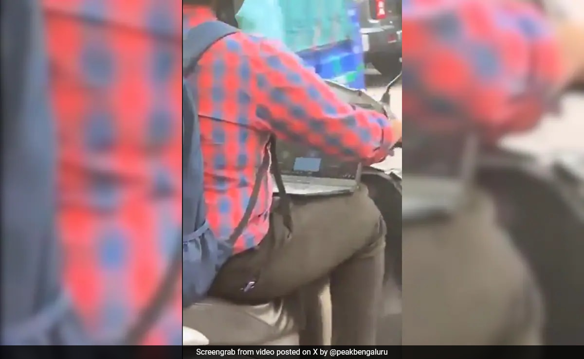 "Bengaluru Is Not For Beginners": Man Attends Meeting On Laptop While Riding Scooty