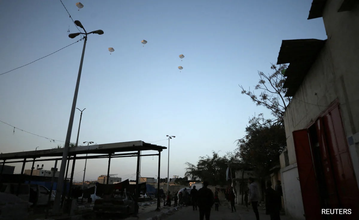 A Can of Beans Shared By 18: Starving Gazans Scramble For Aid Drops