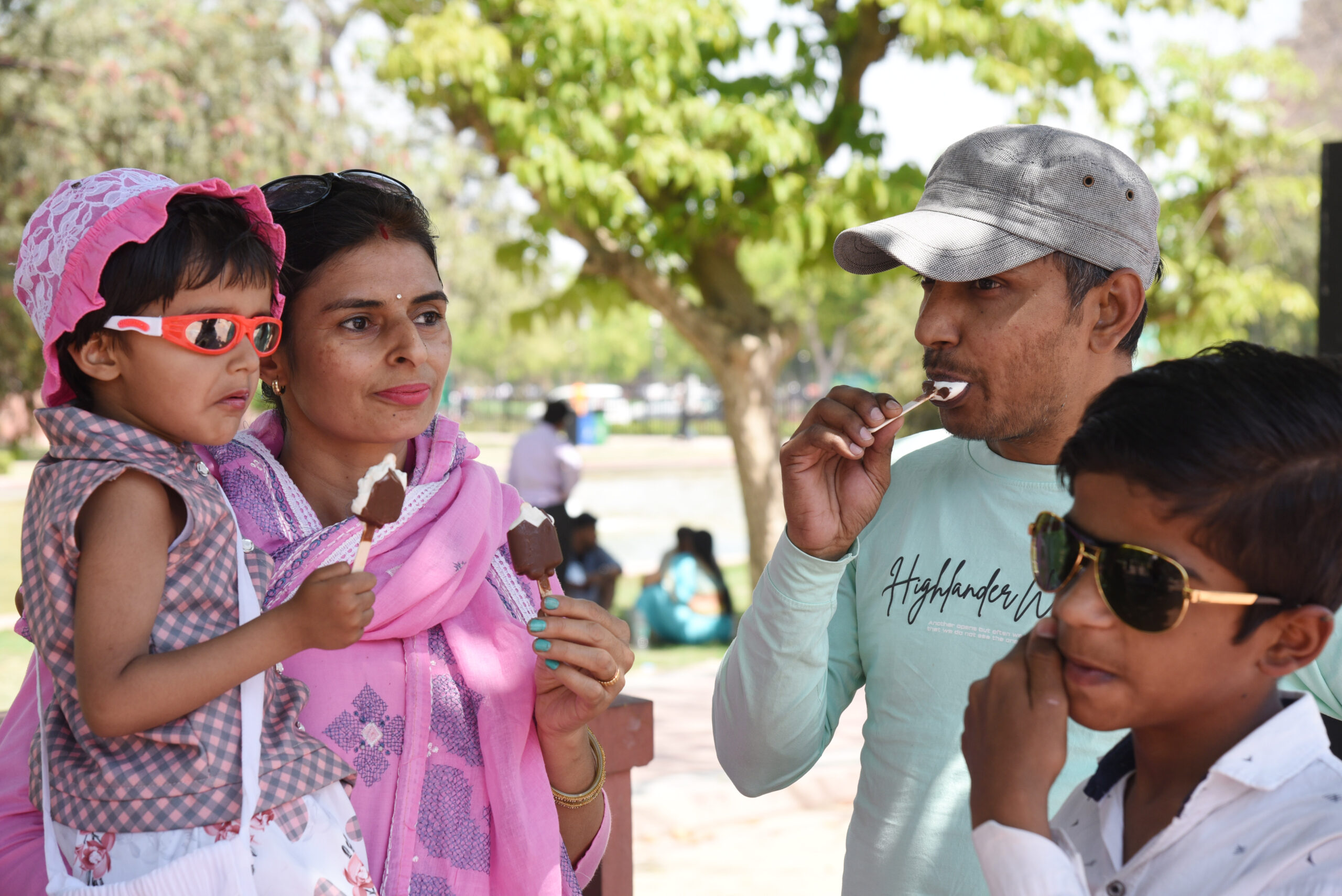 Pics: Umbrellas, Shades, Scarves Come Out As Delhi Temperature Soars