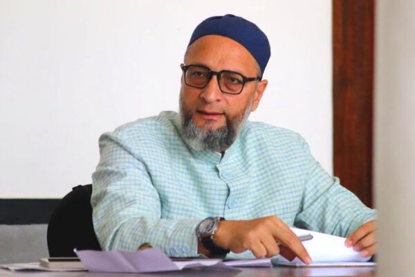 Asaduddin Owaisi stands with Mukhtar Ansari’s family