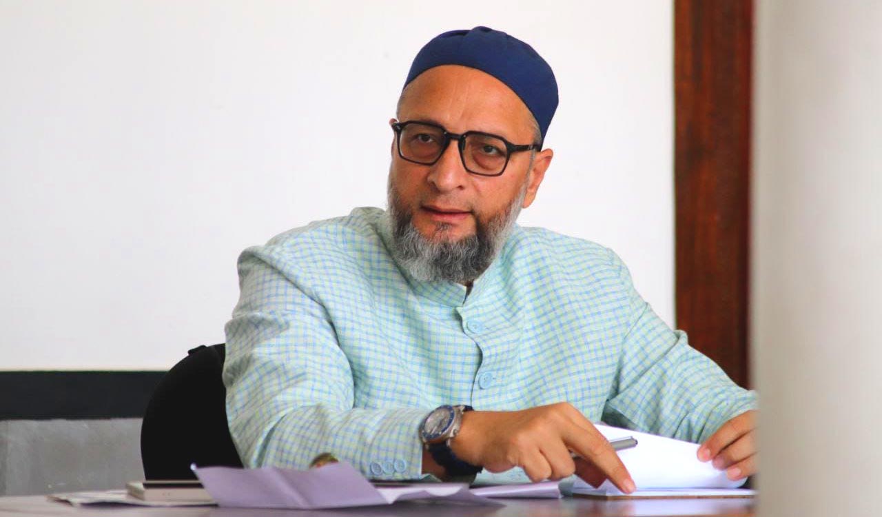 Asaduddin Owaisi stands with Mukhtar Ansari’s family