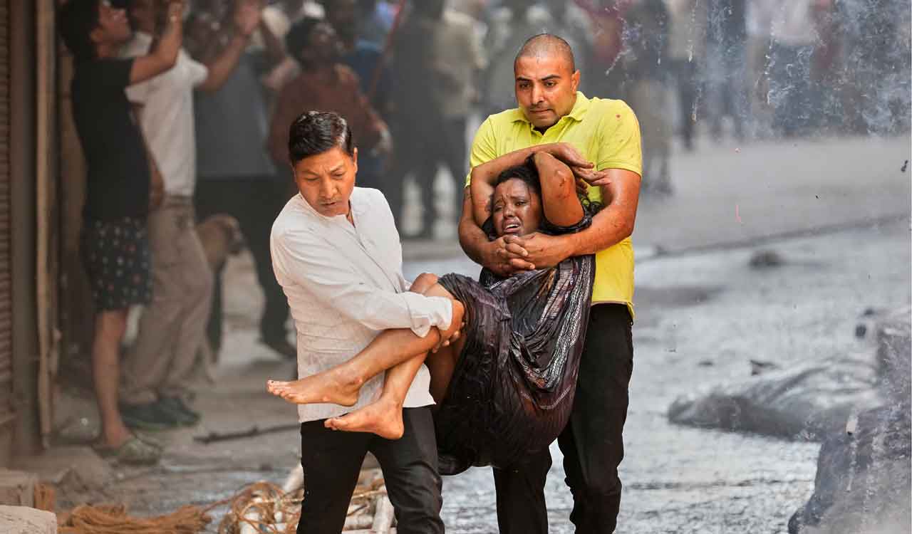 Locals turn rescuers as Delhi hotel blaze kills 21