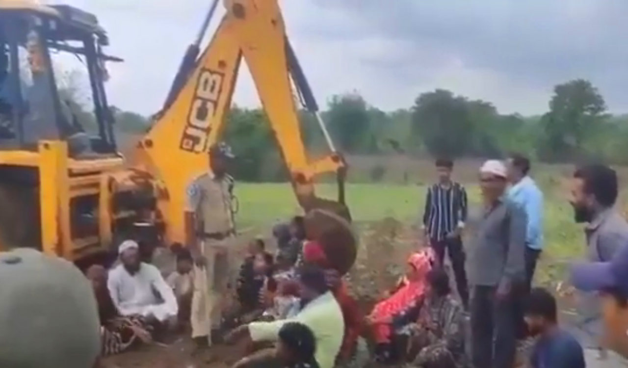 Tribals stop Forest officials from digging trenches near farmlands in Kumram Bheem Asifabad