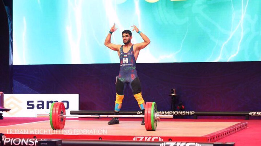 Iranian weightlifter wins nine golds, breaks three world youth records in Tashkent