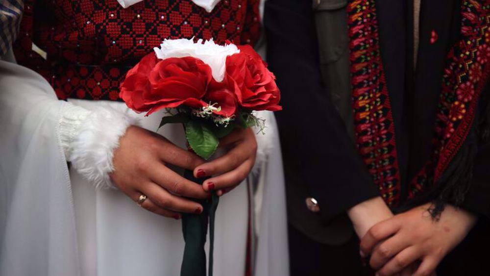 Israeli forces detain Palestinian newlywed couple, storm wedding hall